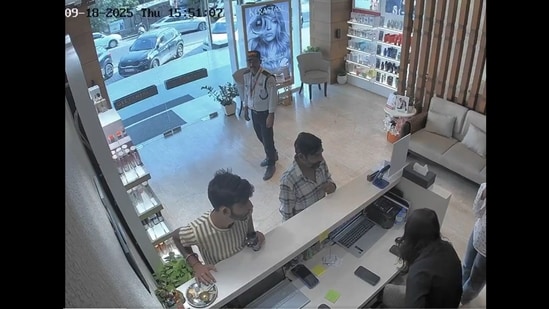 A CCTV video showing a man stealing cash from a puja thali at a store reception has gone viral online, sparking sharp reactions from users. The clip, shared on X by user Ghar Ke Kalesh, is dated September 18 and appears to be from a hair salon. The footage shows two men at the reception desk while the staff are distracted. One of them smoothly slips money from the puja thali kept on the counter and hides it, while the other appears to keep the receptionist engaged in conversation. A security guard is also seen standing a few steps behind the men, oblivious to the theft happening right in front of him. Towards the end of the video, both men are seen leaving the salon together.