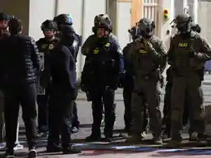 A federal judge in Oregon temporarily blocked President Trump's deployment of the National Guard in Portland, ruling the small protests did not justify federalized forces and could harm state sovereignty. Judge Karin Immergut found the president's decision