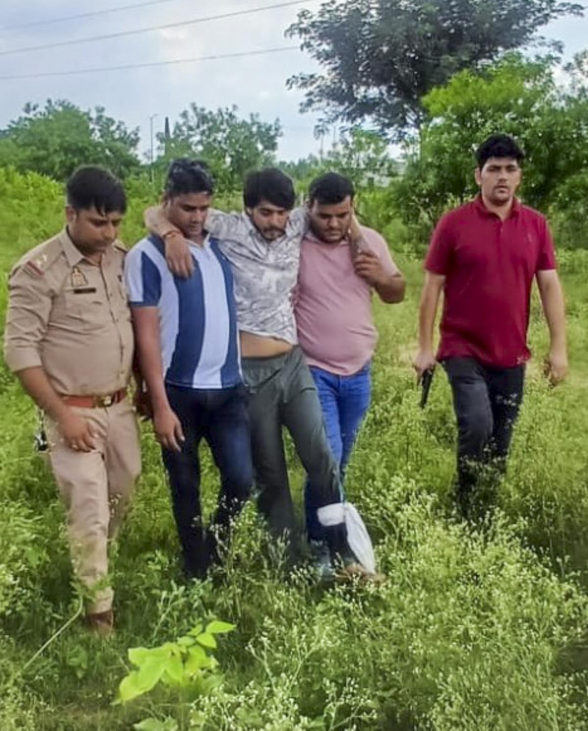 A man accused of setting his wife ablaze over a dowry demand of ₹36 lakh was shot in his leg by police while fleeing custody on Sunday in Greater Noida, an officer said. Vipin Bhati was being escorted for a routine medical check around 1.30 p.m. when he tried to flee, according to the Gautam Buddh Nagar Police PRO. “He was chased and apprehended after being shot in the leg,” the officer said.