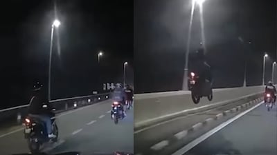 A motorcyclist had a terrifying accident on the Temerloh Bridge in Malaysia on August 22, narrowly avoiding a serious collision with a car. Dashcam footage captured the moment he lost control of his bike after hitting a concrete barrier and was thrown into the air, landing dangerously close in front of an oncoming vehicle.