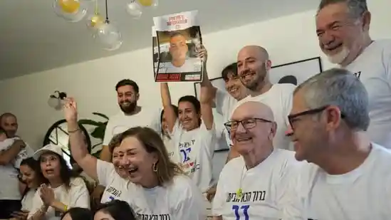 A surprise awaits Hamas hostage Bar Kuperstein as his family waits for his return from captivity. Kuperstein's grandmother, Faina, has received an update that Bar is now in the car with the Red Cross, according to The Times of Israel. Bar's father, Tal Kuperstein, suffered a cerebral incident during an operation following a car accident before the October 7 Hamas attack on Israel. He has now worked to walk and speak again – a surprise that awaits his son.A surprise awaits Hamas hostage Bar Kuperstein as his family waits for his return from captivity. Kuperstein's grandmother, Faina, has received an update that Bar is now in the car with the Red Cross, according to The Times of Israel.Bar's father, Tal Kuperstein, suffered a cerebral incident during an operation following a car accident before the October 7 Hamas attack on Israel. He has now worked to walk and speak again – a surprise that awaits his son.<strong>Read More |</strong> Trump flies over ‘Thank You' banner in Israel as hostages come home from Gaza: Watch