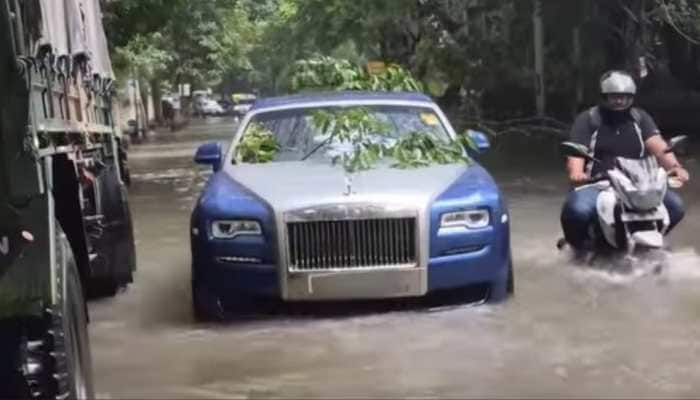 A viral video of a luxury Rolls-Royce stranded in Kolkata's severe floods has ignited a massive social media debate over the city's poor infrastructure and a growing concern about urban flooding. A video of a luxury Rolls-Royce Ghost stranded on a waterlogged road in Kolkata has gone viral on social media, sparking widespread discussion about the city's infrastructure and the broader impact of recent torrential downpours. The incident occurred amidst heavy rain that has inundated the city and caused significant disruption.