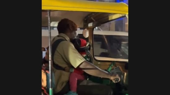 A viral video shared by an Instagram user has struck an emotional chord, showing a Bengaluru auto driver behind the wheel while carrying a baby strapped to his chest. The touching clip, captioned “He drives to earn but carries what he lives for”, has been widely circulated on social media.