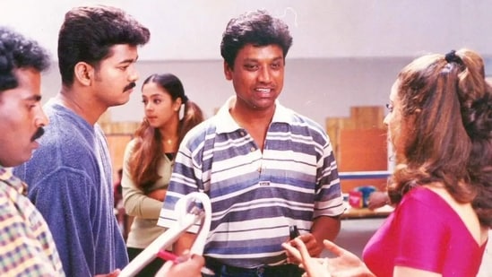 Actor-director SJ Suryah held a press conference in Chennai on Saturday ahead of the re-release of his 2000 film Kushi. The film, starring Vijay and Jyotika in lead roles, will be re-released in theatres 25 years later. At the press meet, a video captured by a paparazzo shows Suryah laughing as a song from his film plays on-screen.