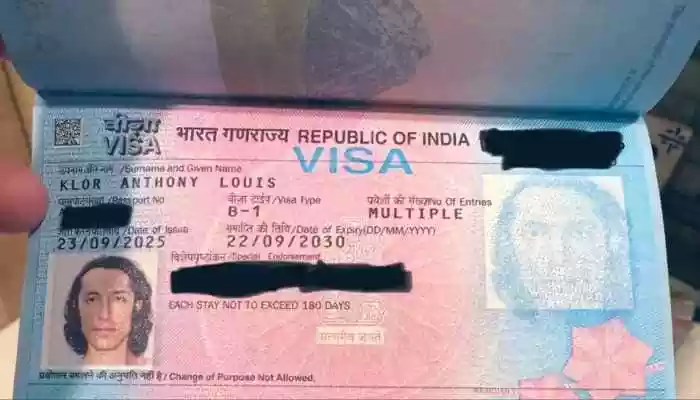 American AI builder Tony Klor flaunts his 5-year Indian B-1 visa, contrasting India's policy with the US, and using the quote 'Modi says welcome home bhai.' See the viral photo and details on the visa for tech builders. An American national based in Bengaluru has taken social media by storm after proudly displaying his new five-year Indian visa, using the moment to draw a sharp contrast between the immigration policies of India and the United States.