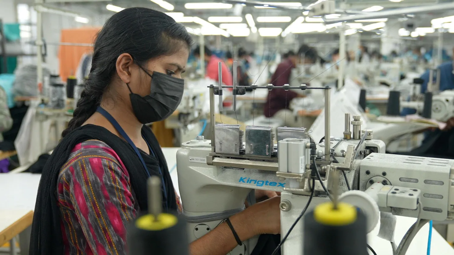 An eerie silence hangs over N Krishnamurthy's garment manufacturing unit in Tiruppur, one of India's largest textile export hubs. Only a fraction of some 200 industrial sewing machines on the floor are in operation, as workers make the last of the season's children's garment orders for some of the biggest US retailers.