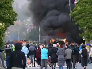 Anti-immigrant protests flare up across Belfast after knife attack