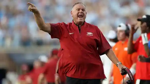 Arkansas head coach Sam Pittman reflected on his team's 56-13 thrashing by No. 22 Notre Dame at Razorback Stadium. Addressing fans clamouring for a coaching change, Pittman said, “I'd be mad at me, too. I get it. I'd be frustrated as hell with me.” The sixth-year coach, whose record stands at 32-33, added, “As long as I am the head coach at Arkansas, I am going to fight.” But with a sellout crowd and national TV audience witnessing the Razorbacks' collapse, the pressure on Pittman's job has reached a boiling point.