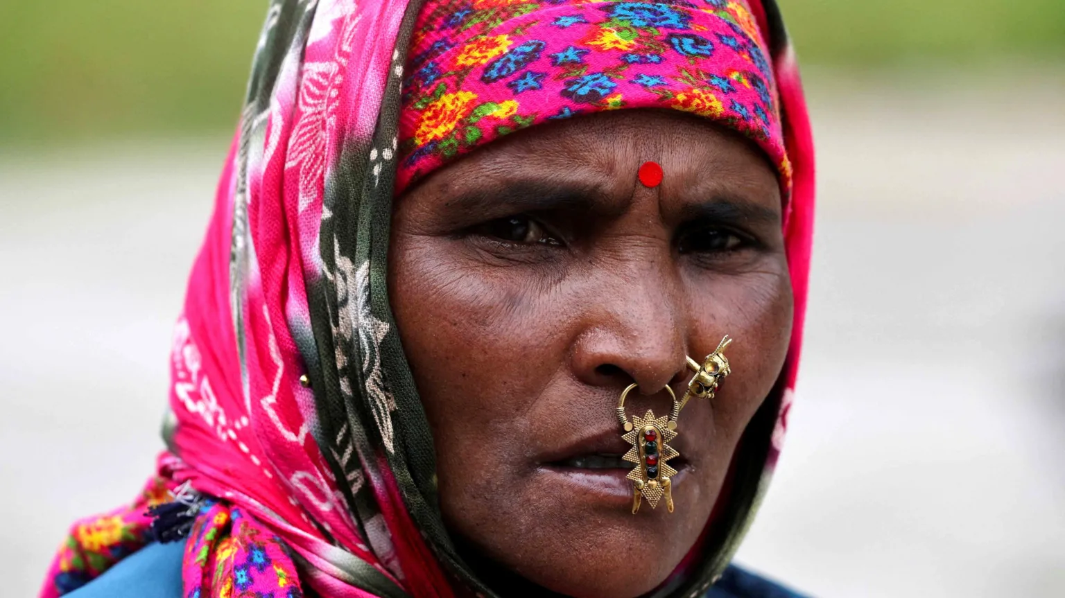 At a bus stand in the northern Indian city of Lucknow, the anxious faces tell their own story. Nepalis who once came to India in search of work are now hurrying back across the border, as the nation reels with its worst unrest in decades.