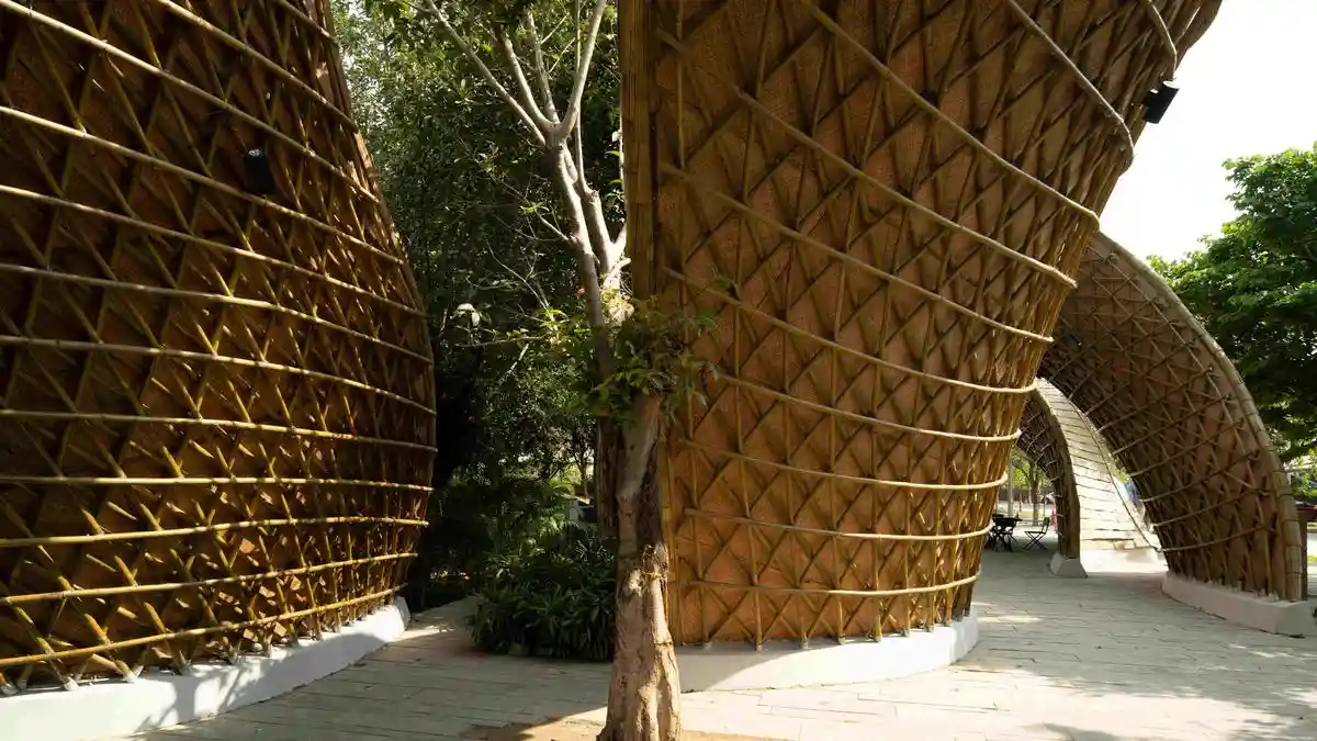 Bamboo, with its flexibility and strength-to-weight ratio (making it as strong as steel in tension), is regarded as one of the finest materials for construction. Apoorva Shroff had this in mind when she started The Hungry Caterpillar at Ashoka University. The project features a food street designed with 3D-printed modular kitchens that reduce waste, recycled plastic furniture, and bamboo canopies inspired by nature's geometry.
