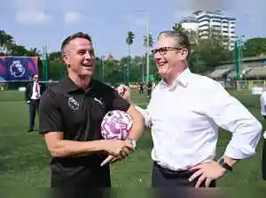 British Prime Minister Keir Starmer praised the Premier League's Community Coach Development Programme in Mumbai, a key initiative for grassroots football in India. The three-day training, delivered with the British Council, saw Premier League coaches upskill 30 local coaches. The programme culminated in a showcase event where coaches demonstrated their new skills with young players from the Oscar Foundation.British Prime Minister Keir Starmer praised the Premier League's Community Coach Development Programme in Mumbai, a key initiative for grassroots football in India. The three-day training, delivered with the British Council, saw Premier League coaches upskill 30 local coaches. The programme culminated in a showcase event where coaches demonstrated their new skills with young players from the Oscar Foundation.Mumbai, British Prime Minister Keir Starmer has lauded the Premier League's long-term commitment to supporting grassroots football in India through a Community Coach Development Programme in Mumbai.<br><br>The three-day programme was central to the league's week-long fan and community engagement initiatives in India -- its first major milestone since the opening of its Mumbai office earlier this year.<br><br>Delivered in partnership with the British Council, the three-day programme was led by coaches from the Premier League, Brentford and Newcastle United, who provided expert training to 30 community coaches, helping expand access to football across India.<br><br>The activity culminated in a showcase event at the Cooperage Football Ground in Mumbai.<br><br>The community coaches put the skills they have learned into practice with 80 children from the Oscar Foundation, highlighting how the programme empowers local leaders to inspire the next generation through football.<br><br>Among the special guests in attendance were UK PM Starmer and Premier League legend Michael Owen, who interacted with the coaches and the young players.<br><br>Starmer said: