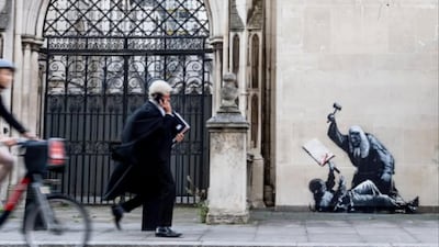 British street artist Banksy has painted a striking mural on the exterior of London's High Court, apparently criticising the recent crackdown on pro-Palestine demonstrations. Banksy's latest artwork depicts a bewigged judge wielding a gavel to hit a protester who has been knocked to the ground with a blood-stained placard in hand.