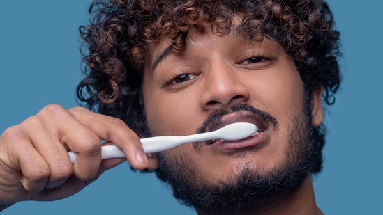 Can brushing too hard or overbrushing actually damage your teeth? A prosthodontist explains how these two habits can cause all kinds of dental problems for you. Brushing your teeth may not be the most glamorous activity, but it is necessary for a healthier you. Rather than treating brushing — something that's recommended you do twice a day — as just another box to check, why not learn what the best dental practices are? For instance, did you know that brushing your teeth right after every meal is not the best dental health habit? Also read | Skipping brushing your teeth before sleep? Doctor explains how your heart is paying the price