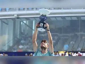 Carlos Alcaraz secured the Cincinnati Open title. Jannik Sinner retired early in the first set due to illness. Sinner's retirement occurred after trailing 5-0. He had been on a 12-match winning streak. Alcaraz expressed his happiness at winning the trophy. He also wished Sinner a speedy recovery. The Cincinnati Open serves as a tune-up for the U.S. Open.