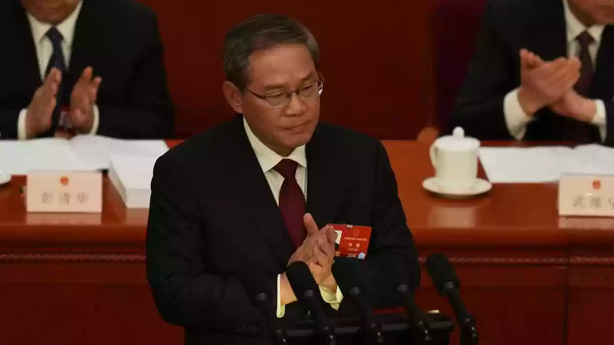 China lowers economic growth target to 4