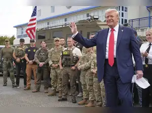 Defense Secretary Pete Hegseth has ordered the arming of National Guard troops patrolling Washington D.C. as part of President Trump's law enforcement crackdown. This marks an escalation in the federal intervention, with nearly 2,000 National Guard members now stationed in the city, including troops from multiple states.