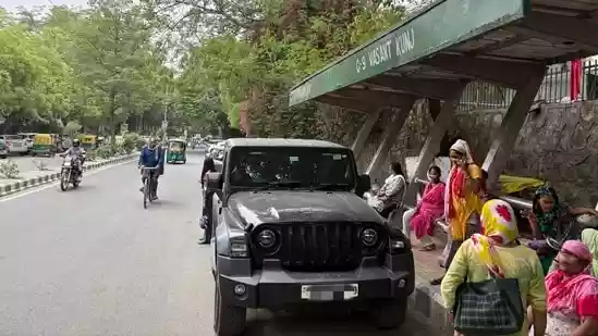 Delhi man calls out car parked at DTC bus stop