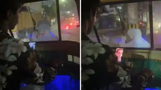 Distracted auto driver almost hits reversing truck while scrolling through reels