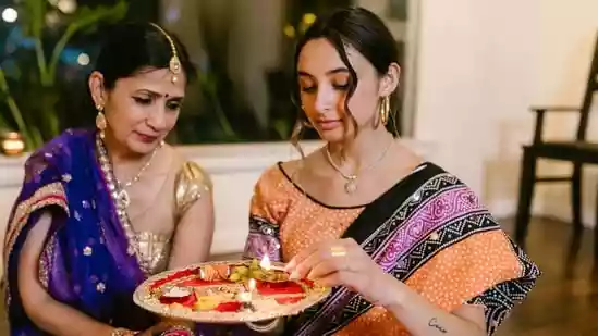 Diwali is the festival of lights and it is also the festival of looking your best. But with so many family get-togethers, pujas, and parties on your calendar, it's natural to feel overwhelmed when picking the perfect ethnic outfit. Amazon is here with some absolutely stunning traditional wear at irresistible prices from elegant sarees to twirl-worthy Anarkalis and chic lehengas. Here are 8 gorgeous ethnic picks to help you slay every Diwali occasion with ease and grace.Diwali is the festival of lights and it is also the festival of looking your best. But with so many family get-togethers, pujas, and parties on your calendar, it's natural to feel overwhelmed when picking the perfect ethnic outfit. Amazon is here with some absolutely stunning traditional wear at irresistible prices from elegant sarees to twirl-worthy Anarkalis and chic lehengas. Here are 8 gorgeous ethnic picks to help you slay every Diwali occasion with ease and grace.For a classic festive look, this EthnicJunction Paithani Silk Blend Saree in vibrant red is a perfect choice. Crafted with intricate zari weaving and a traditional pallu design, this saree radiates royal elegance. The silk blend fabric drapes beautifully, adding a regal charm to your look. Whether you're attending a family puja or hosting a Diwali dinner, this saree brings a timeless Maharashtrian flair that never goes out of style.