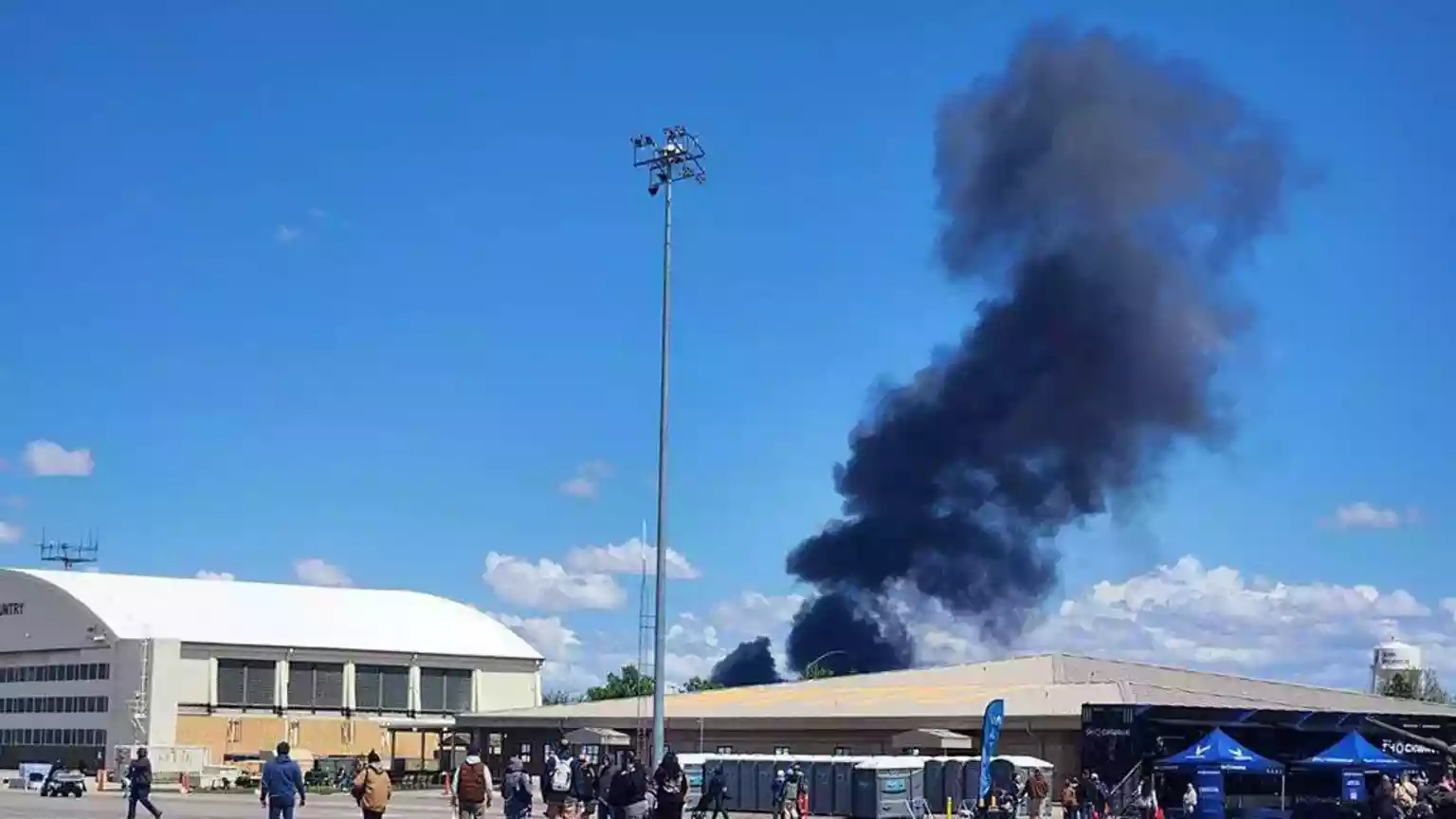 Fighter jet crews parachute safely after collision at US air show