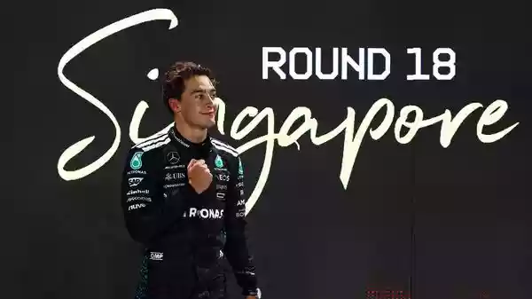 George Russell secured his first-ever pole position at the Singapore Grand Prix, delivering a masterful lap around the Marina Bay street circuit to outshine Red Bull's Max Verstappen. Under the iconic floodlights, Russell's performance for Mercedes highlighted both his skill and the team's recent upgrades.