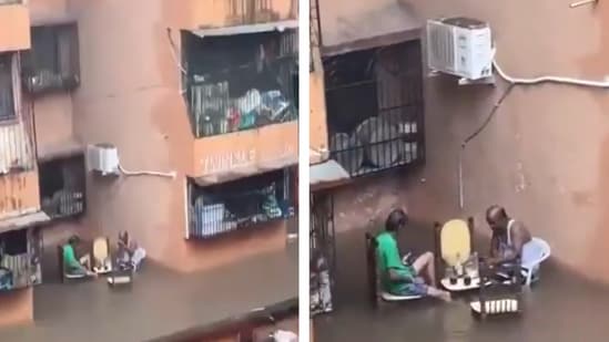 Heavy rain continued to disrupt normal life in Mumbai on Wednesday – but one video shows how even a red alert can't interfere with the daily routine of Mumbaikars. Over the last two days, India's financial capital has witnessed persistent rainfall that has brought life to a standstill. Some local trains were cancelled, while government offices declared a holiday. Private offices were urged to let employees work from home as some neighbourhoods saw severe waterlogging.