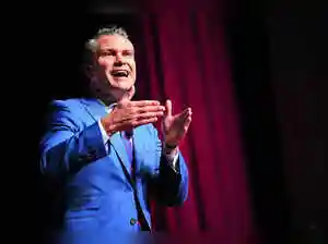 Hegseth, a former Fox News personality, was joined by U.S. President Donald Trump, himself a former reality television host, for an on-camera event in Quantico, Virginia that had a made-for-TV character to it with generals and admirals assembled on short notice.