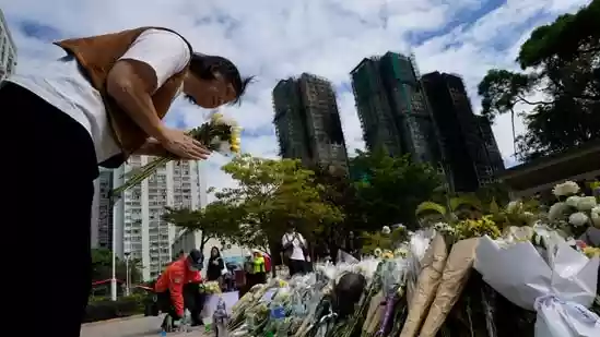 Hong Kong orders judge-led inquiry into fire that killed 156