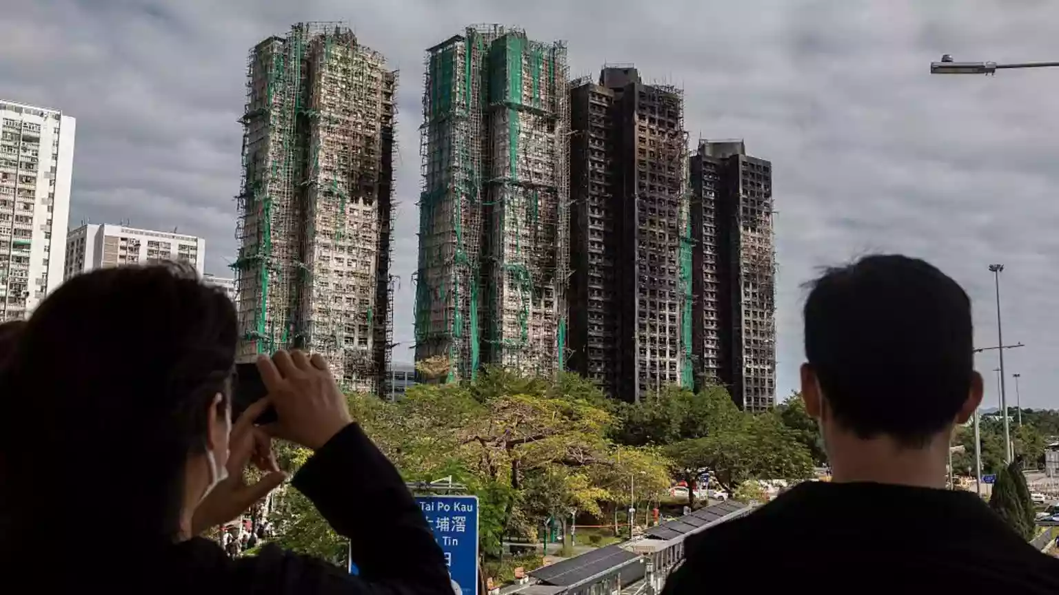 Hong Kong votes in election as city mourns deadly fire