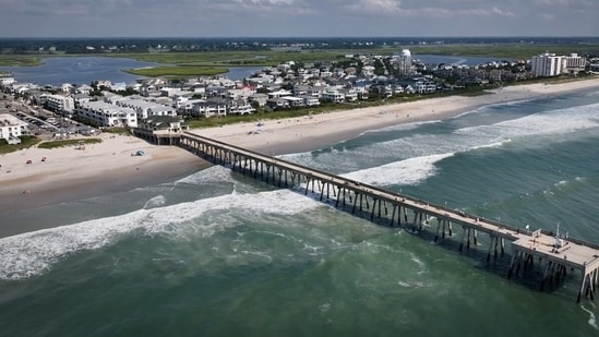 Hurricane Erin may be spinning hundreds of miles offshore, but its impact is being felt hard along the East Coast. Dozens of swimmers had to be rescued from rip currents over the weekend, forcing local officials to clamp down on beach access. In North Carolina, Wrightsville Beach lifeguards pulled about 60 people from the water, according to the Wilmington Star-News.