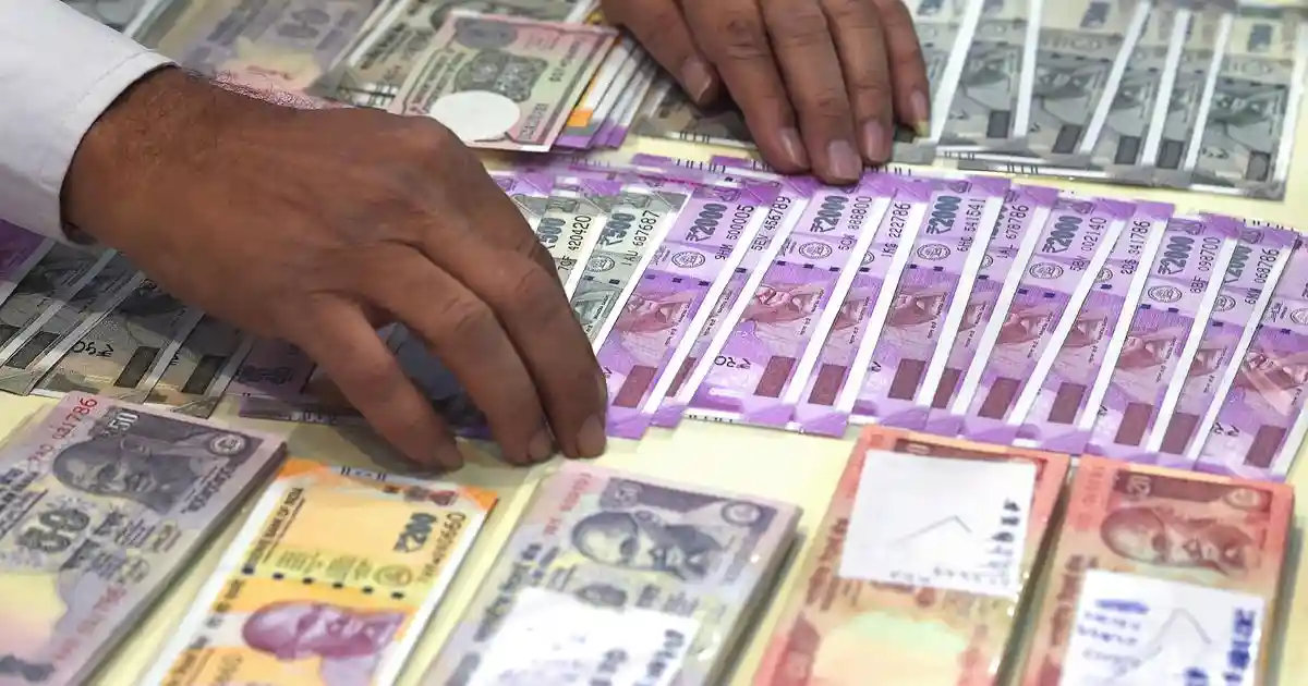Indian rupee sinks to record low of 90