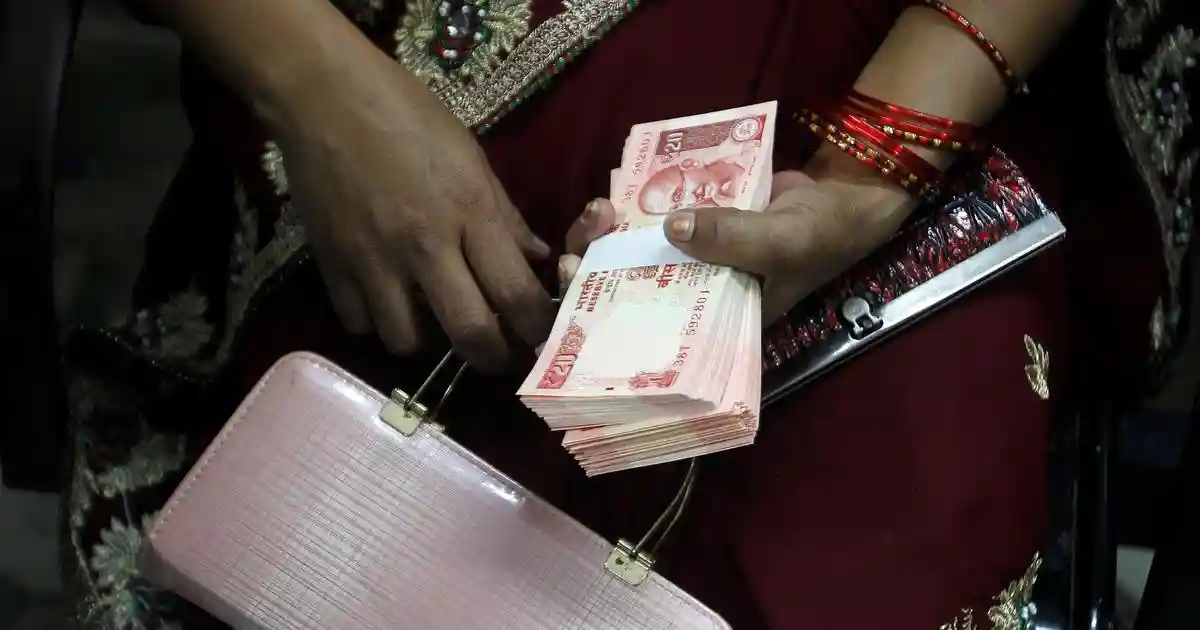 Indian rupee sinks to record low of nearly 92 per US dollar