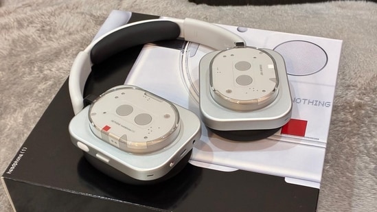 Is Nothing Headphone 1 worth the hype? Know if its uncommon design and attractive-looking features are enough to convince buyers. The secret is out, and we finally get the official look of Nothing’s first-ever Headphone 1. Since the first leak of the headphones, the unusual design of the audio wearable instantly grabbed attention. While the design has grown over me from the past couple of days, it's worth mentioning that the specifications, features, and the audio quality are the real deal, which makes it a market disruptor.