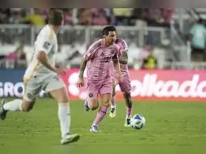 Lionel Messi's spectacular return from injury propelled Inter Miami to a 3-1 victory over the Los Angeles Galaxy. Messi scored a stunning goal and assisted Luis Suárez, securing Miami's first league win since July. Jordi Alba also contributed with a goal, while Joseph Paintsil scored for the Galaxy, who ultimately succumbed to Miami's dominance.