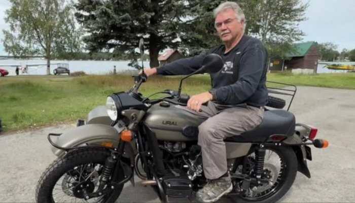 Mark Warren, a retired fire inspector from Anchorage, was presented with a $22,000 (approximately Rs 19 lakh) Ural Gear Up motorcycle in olive green, complete with a sidecar, just days before the US-Russia summit in August. <strong>New Delhi: </strong>An Alaska resident was left stunned after receiving a brand-new motorcycle, personally gifted by Russian President Vladimir Putin's team, following an unexpected moment of viral fame.