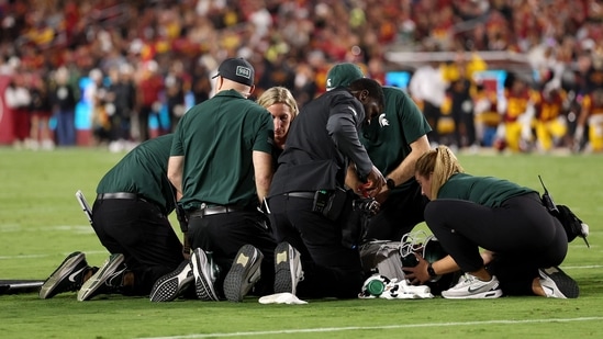 Michigan State linebacker Wayne Matthews III was taken off the field by ambulance during Saturday's game against USC. The scene was tense and quiet inside the stadium until Matthews lifted a thumb in the air, a sign that sparked applause but did little to ease the concern.