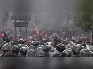 Nepal plunged into its worst unrest in two decades as protests over a social media ban and corruption spiraled, leaving at least 19 dead. Demonstrators torched parliament and politicians' homes, forcing PM KP Sharma Oli to resign. The army rolled out tanks, warning looting and arson will be punished, while global leaders urged restraint and dialogue to restore stability.