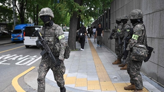 North Korea accused the South's military on Saturday of firing warning shots at its troops near their heavily fortified border, saying it risked raising tensions to