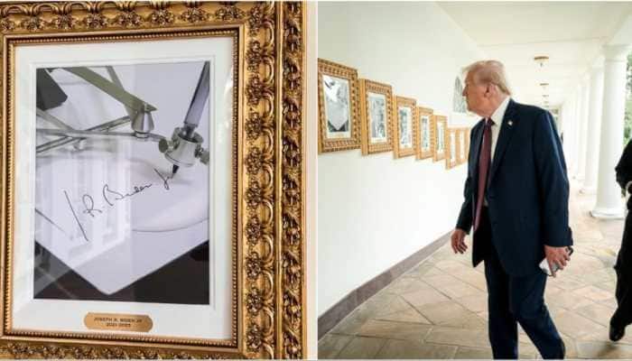 President Trump added a new Presidential Walk of Fame to the White House exterior, but notably replaced a portrait of his predecessor, Joe Biden, with a photo of an autopen signing Biden's name. In his most recent and most quirky move to taunt his opponent, President Donald Trump has installed a new Presidential Walk of Fame outside the White House, showcasing portraits of previous U.S. presidents. But Biden's display is a stark and conspicuous slight: rather than a portrait, Trump placed a photo of an autopen signing the Democrat's name.