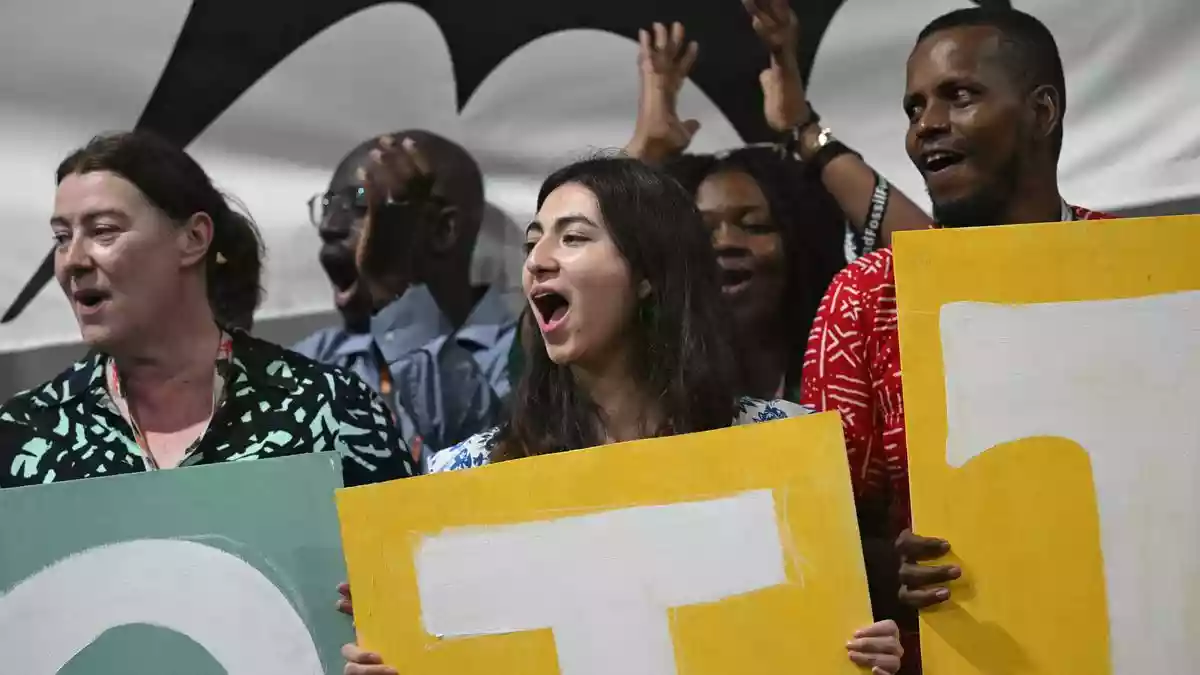 Protesters confront security at main venue of UN climate talks