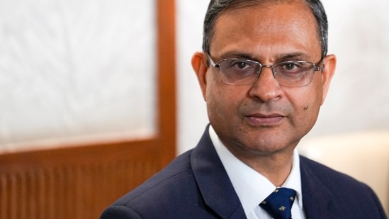 RBI Governor says forex market curbs won't remain forever
