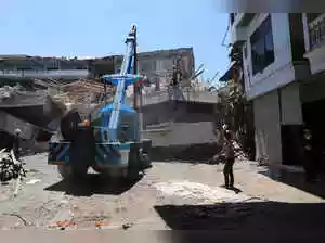 Rescuers detected no more signs of life at a collapsed Indonesian school. Fifty-nine people were still feared missing after the building gave way. Five individuals were confirmed dead. High-tech thermal drones aided the search efforts. Families awaited news of their loved ones near the site. Investigations into the collapse cause were underway. Substandard construction was a suspected factor.