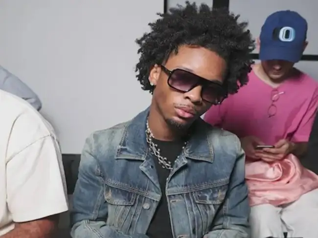 Singer D4vd faces intense scrutiny after a teen's body was found in his Tesla, leading to tour cancellations and police investigation. A resurfaced TikTok comment accusing him of inappropriate behavior with a minor has fueled speculation. D4vd is under police investigation and multiple reports claim he released a video in February which shows him dragging a corpse into a truck.