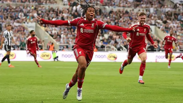 Sixteen-year-old Rio Ngumoha became the fourth youngest scorer in Premier League history when he swept home Liverpool's winning goal in their </b>3-2 victory at Newcastle on Monday night.</b> Reds boss Arne Slot turned to the teenager in the sixth minute of stoppage time, throwing on a player who will turn 17 on Friday in a last roll of the dice.