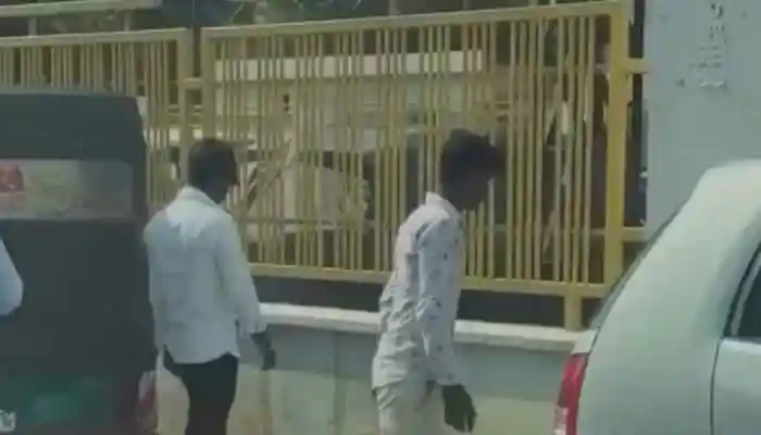 Spitting in public is not just an unpleasant habit; it reflects a lack of civic responsibility. Addressing this problem requires a combination of awareness, strict enforcement of laws, and fostering a culture of respect for public spaces. In a video that is making rounds on social media, a man stops his vehicle and catches two young men spitting on the road in the act and goes on to slap them and later makes them apologise and even do sit-ups. The internet is divided, with some questioning his authority to slap while some appreciated his actions.