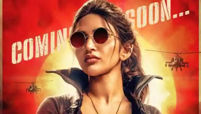 Sreeleela has an intense love story drama with Kartik Aaryan in the pipeline. The Anurag Basu film is yet to be titled. New Delhi: A day after Bobby Deol set screens on fire with his intense mysterious villainous look as Professor White Noise, now actress Sreeleela has stepped into the spotlight with her first poster from the untitled project, as 'Agent Mirchi'. She will be seen in a never-before-seen action avatar. Sreeleela has an intense love story drama with Kartik Aaryan in the pipeline. The Anurag Basu film is yet to be titled. New Delhi: A day after Bobby Deol set screens on fire with his intense mysterious villainous look as Professor White Noise, now actress Sreeleela has stepped into the spotlight with her first poster from the untitled project, as 'Agent Mirchi'. She will be seen in a never-before-seen action avatar.In the poster, Sreeleela exudes undercover-agent energy with her piercing gaze, sharp stance, and confident poise. Dressed in a deep-toned outfit that perfectly balances elegance with toughness, she radiates strength, spunk, and charisma. She wrote on social media: <strong>Ready, steady, fire...</strong><strong>Mirchi lagne wali hai! Oct 19 #AagLagaaDe</strong>