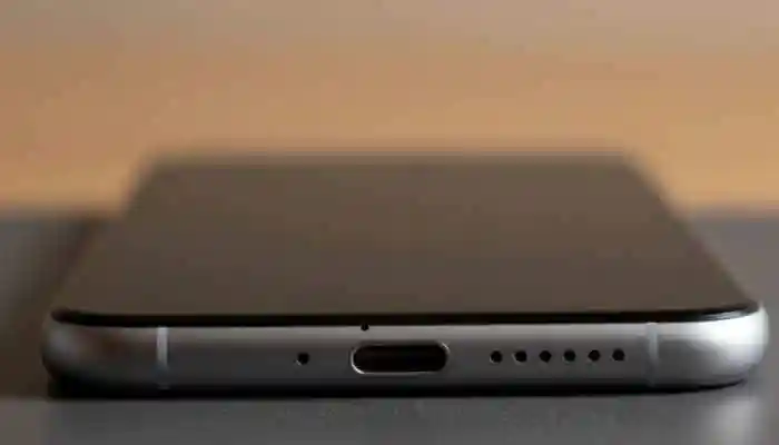 <strong>Smartphone Tiny Hole: </strong>Today, even budget phones often include at least one extra mic to meet user expectations. This is one way affordable Android phones can rival pricier models <strong>Smartphone Tiny Hole:</strong> Did you know that the tiny hole next to your phone's charging port isn't just a random design element? Many people mistake it for a reset button or an extra microphone, but it actually serves an important purpose. It's not for cosmetic flair or for venting steam. That tiny hole exists by design, and its role matters a lot more than you think. Some mistake it for the SIM ejection hole. But this is elsewhere and requires a tool or pin.<strong>Smartphone Tiny Hole: </strong>Today, even budget phones often include at least one extra mic to meet user expectations. This is one way affordable Android phones can rival pricier models <strong>Smartphone Tiny Hole:</strong> Did you know that the tiny hole next to your phone's charging port isn't just a random design element? Many people mistake it for a reset button or an extra microphone, but it actually serves an important purpose. It's not for cosmetic flair or for venting steam. That tiny hole exists by design, and its role matters a lot more than you think. Some mistake it for the SIM ejection hole. But this is elsewhere and requires a tool or pin.