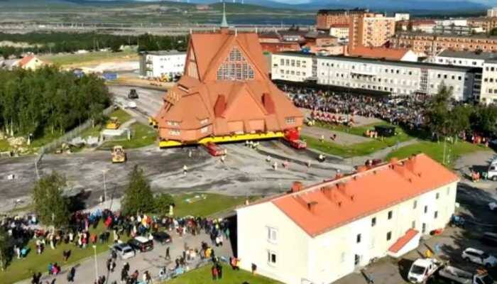 Sweden's 113-year-old Kiruna Church has been moved to a new location covering five kilometers of Arctic roads. The move was necessary because the land under Kiruna is sinking due to iron ore mining. Sweden has just completed a huge and historic task: moving the 113-year-old Kiruna Church to a new location. The 600-ton wooden church was slowly transported over two days, covering five kilometers of Arctic roads. Thousands of people gathered to watch, including Sweden's king.