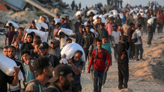 The crowd was open fired at Khan Younis, said witnesses. Parallelly, Ramallah reported that phone service and internet access was cut in central and south Gaza. At least 51 Palestinians were killed and more than 200 wounded in the Gaza Strip while waiting for U.N. and commercial trucks to enter the territory with desperately needed food, according to Gaza's Health Ministry and a local hospital.