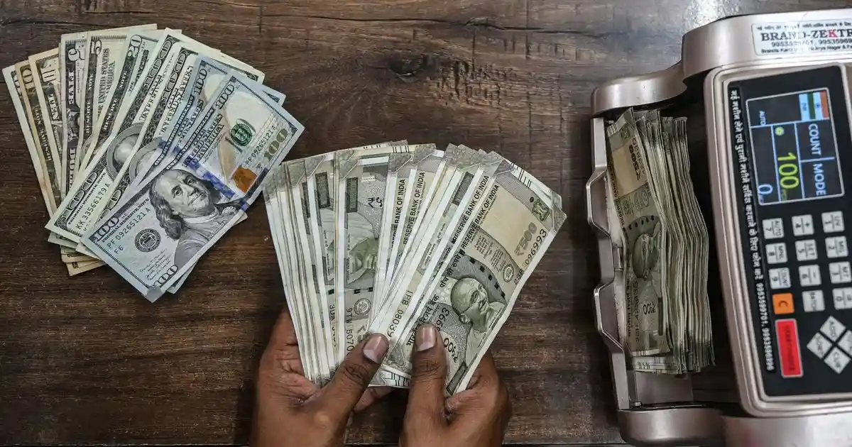 The Indian rupee sank to an all-time low of 88.64 against the United States dollar in early trade on Tuesday amid external headwinds such as tariffs imposed by Washington and increase in the H-1B visa fee. The depreciation of the rupee was also driven by uncertainty around the trade policy and risk aversion among domestic investors, PTI reported.